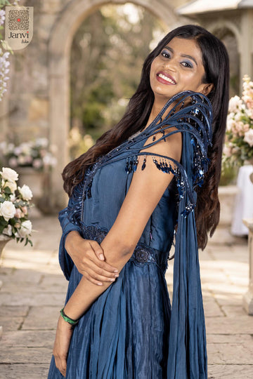 Enchanting waist up view displaying alluring navy blue indian clothes for your next grand event.