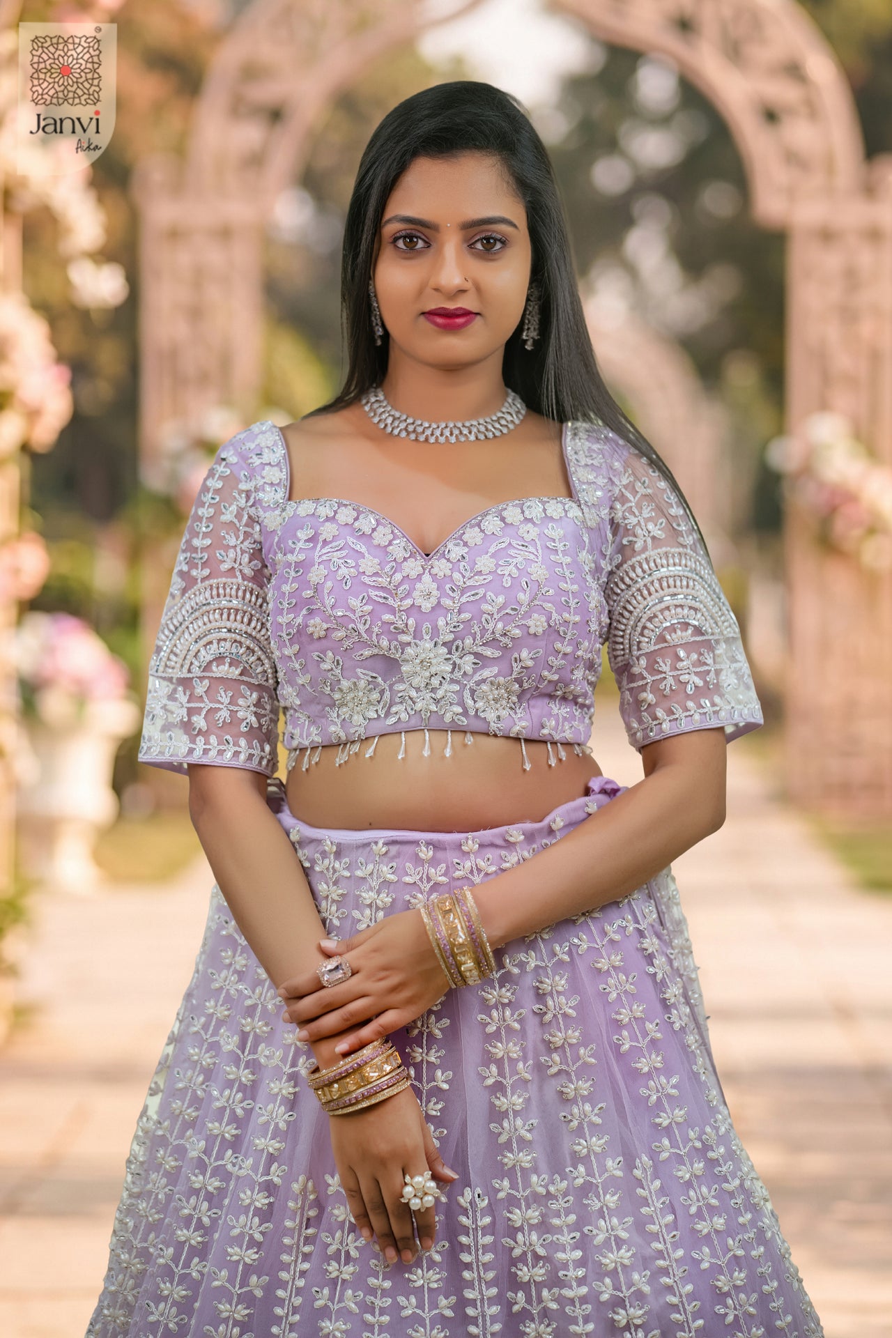 Back view showing neckline styling of Mrinalika for women's black dresses with sleeves.