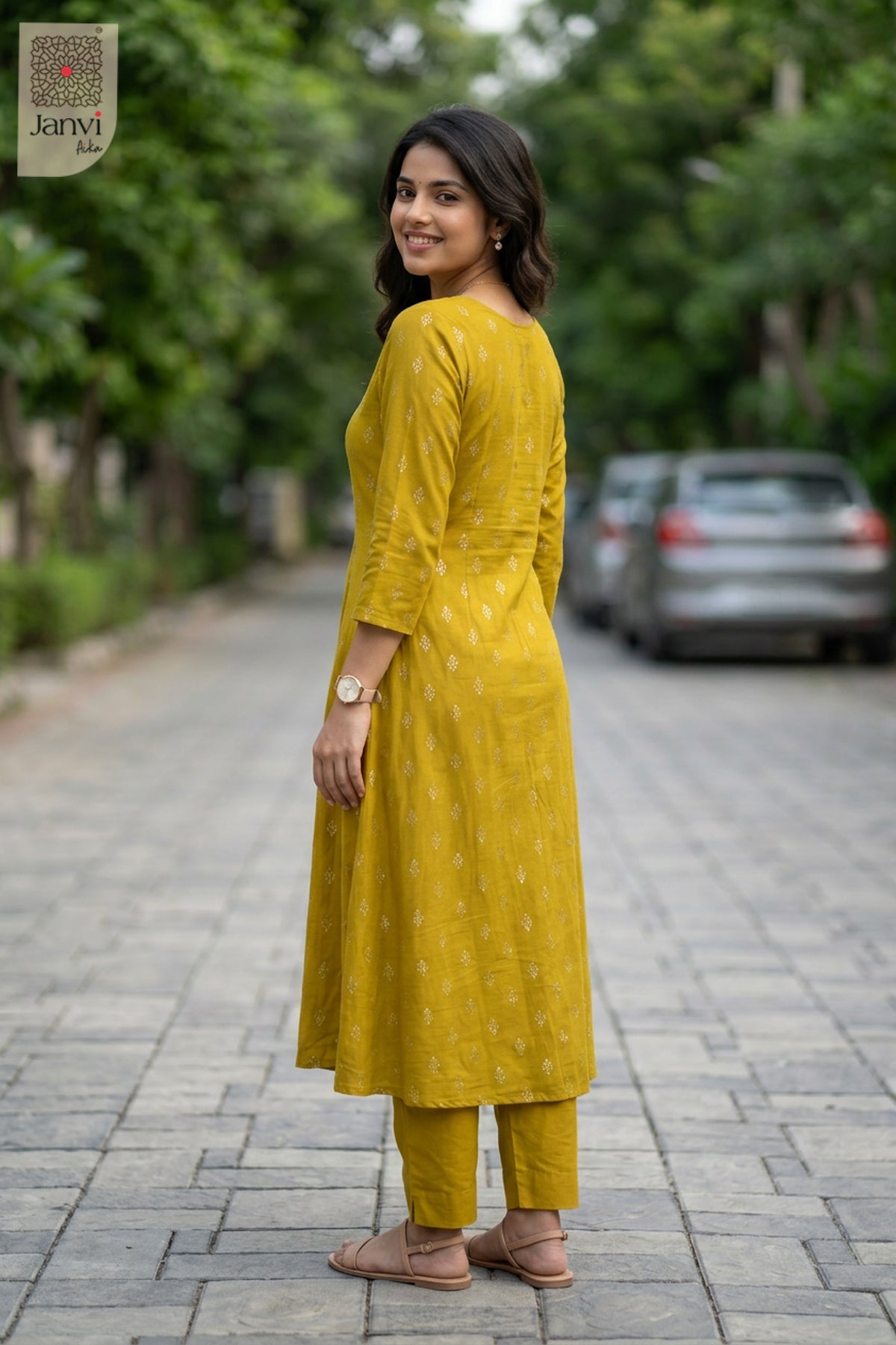 Front angled view of the flared silhouette of Mustard for casual birthday party outfits for ladies.