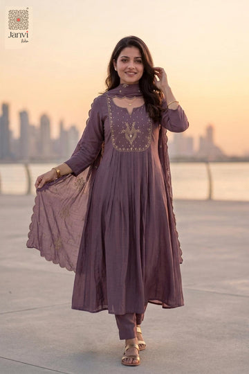 Front full standing view of a dark lavender festive pleated anarkali kurta.
