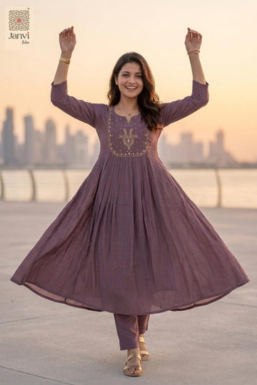 Twirling flare movement highlighting a dark lavender pleated anarkali lehenga dress.