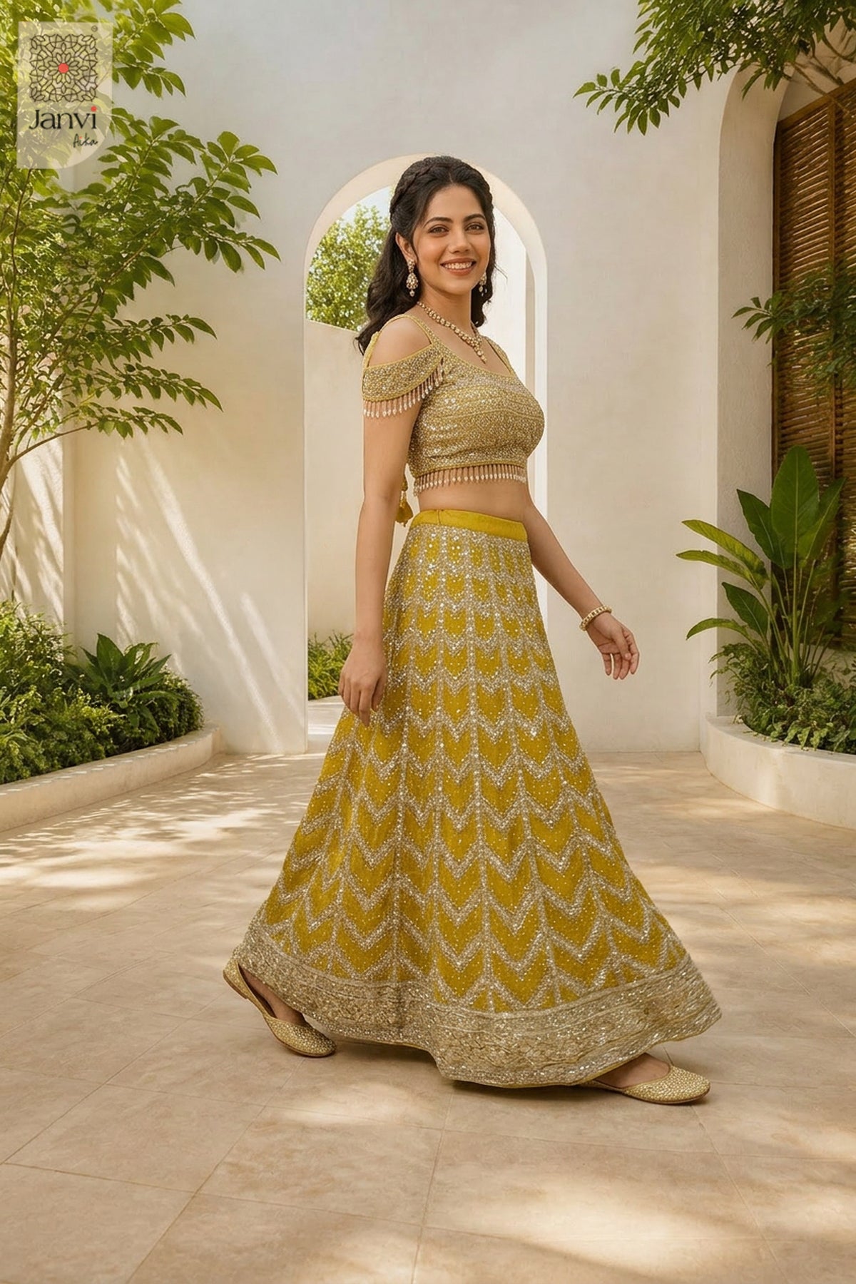 This standing side profile shot showcases a gorgeous mustard gold georgette and net lehenga.