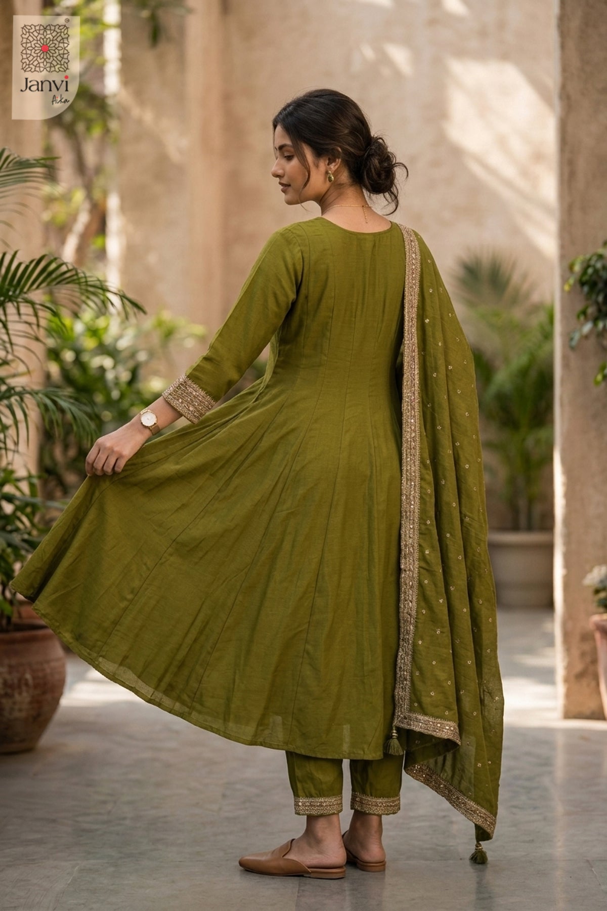 Front angled view of the flared silhouette of Noor Olivia for women's online clothing boutique.