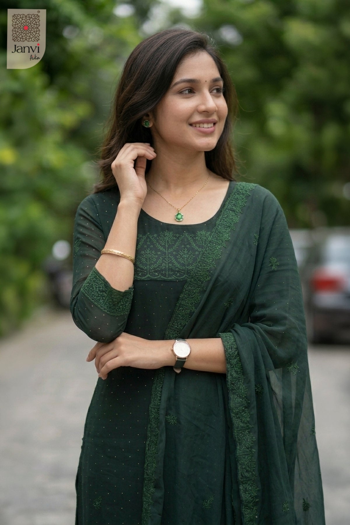 Close-up of bodice and embroidery of Nyra Deep Green Couture for simple party wear dress for ladies.
