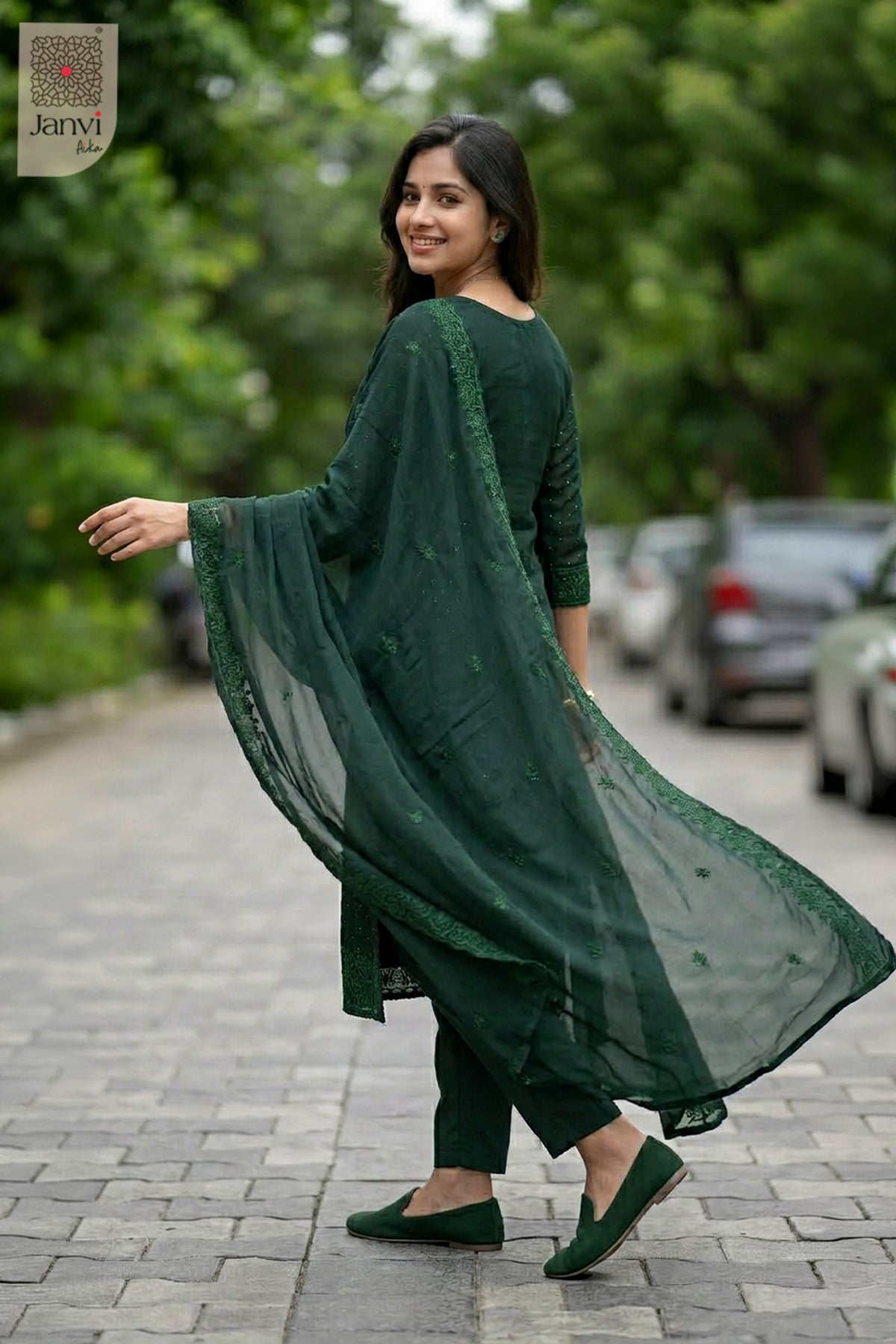 Back view showing neckline styling of Nyra Deep Green for indian party wear dress for ladies.