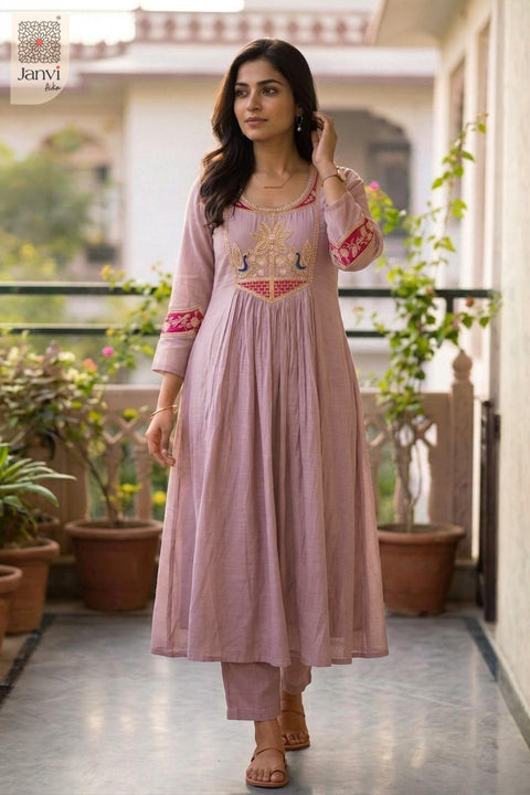 Front standing view of a light lavender festive pleated flared anarkali kurta.