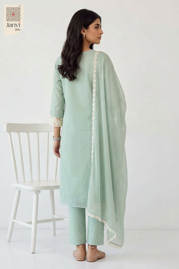 Rear view showing printed back and sheer dupatta drape of a churidar sleeves kurti.