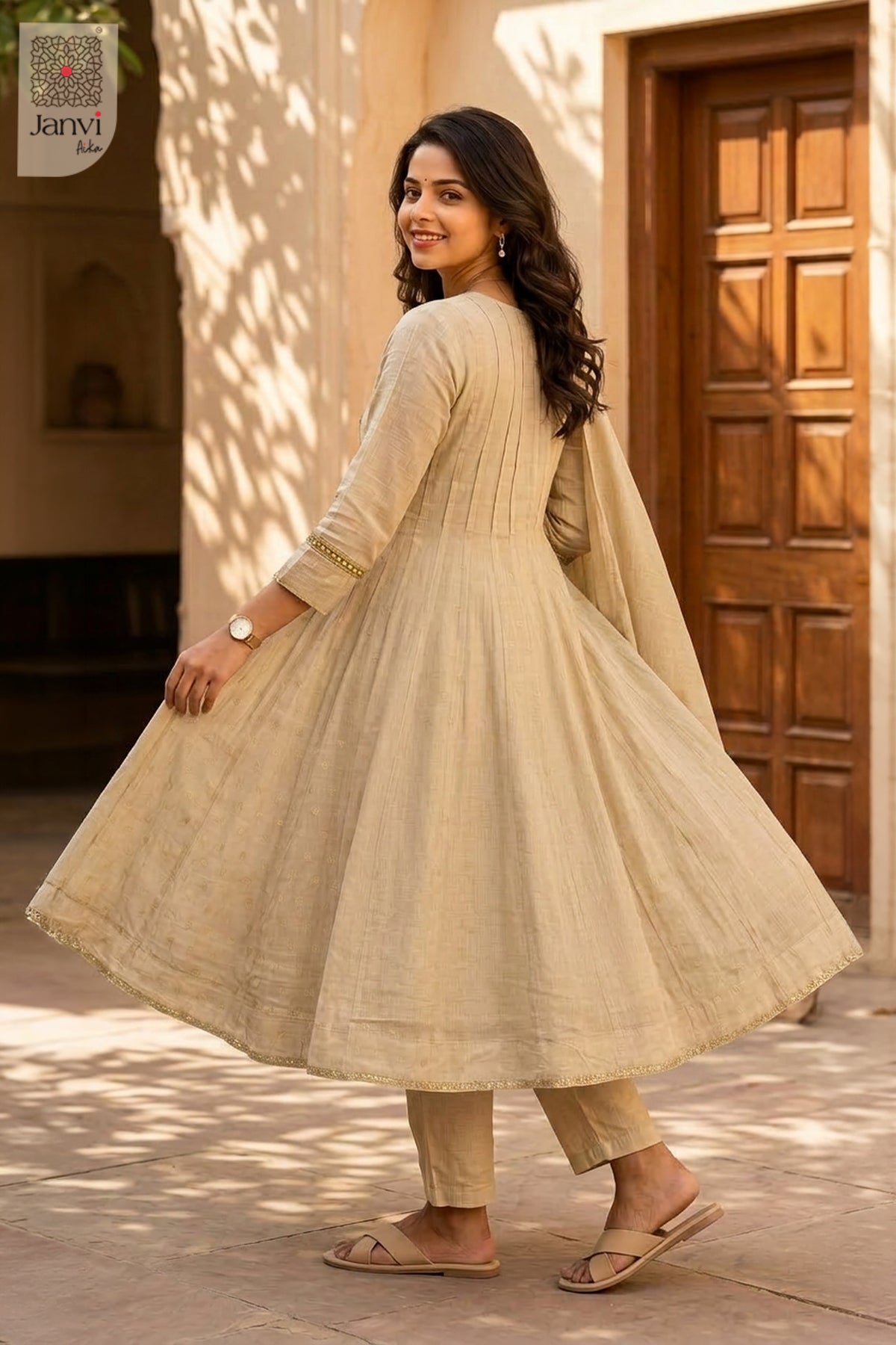 Back view showing neckline styling of Pista Swirl for simple party wear dress for ladies.