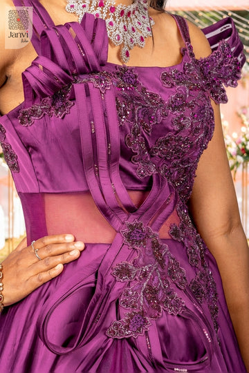 Discover intricate embroidery on this womens long gown in a detailed close up view.
