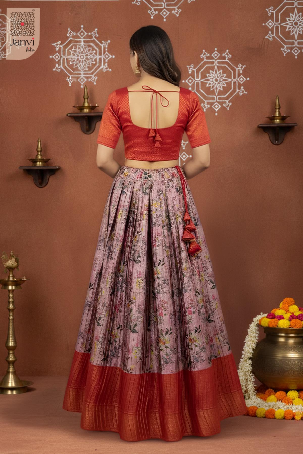 Rear full standing shot of a half saree as a beautiful half saree lehenga for weddings.
