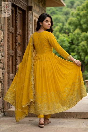 Front angled view of the flared silhouette of Rajasi Haldi for birthday party dresses for ladies.