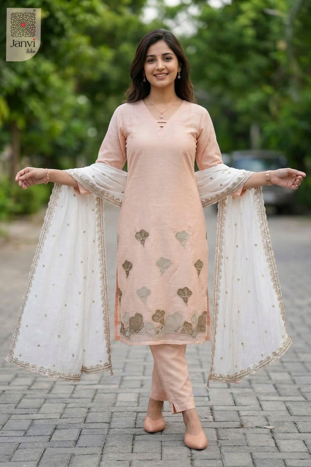 Close-up of bodice and embroidery of Roselyn Soft Blush for best online boutiques for dresses.