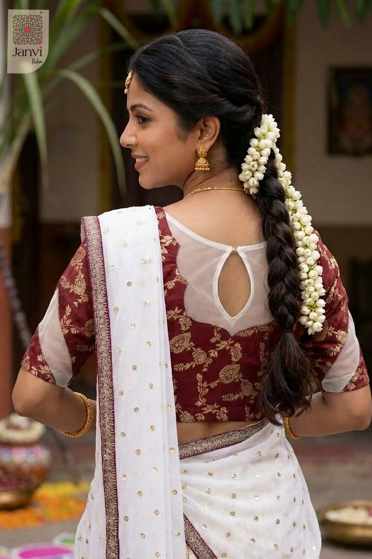 Waist up rear keyhole neck of a half saree as a beautiful party lehenga saree for weddings.