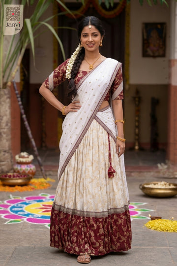 Front full standing shot of a half saree as a beautiful golden work lehenga saree for weddings.