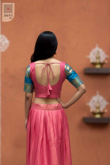 Front angled view of the flared silhouette of Rose Lagoon Half for saree collection for party wear.