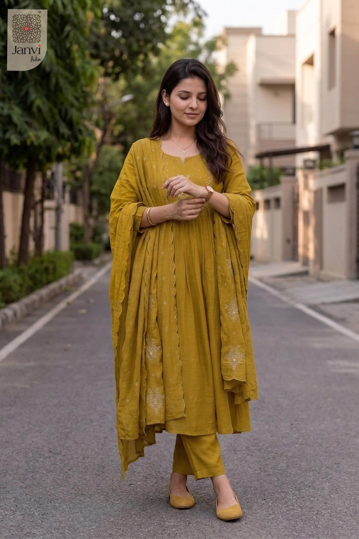 Outdoor walking sequence pose in a festive mustard yellow flared anarkali kurta set.