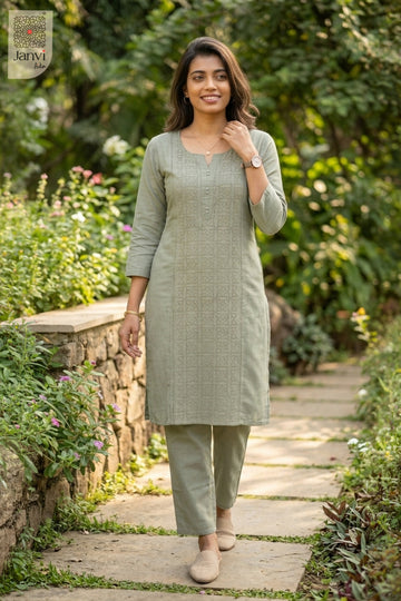 Walking view of Sage Sernity from the 2 piece outfits for ladies collection with elbow sleeves.