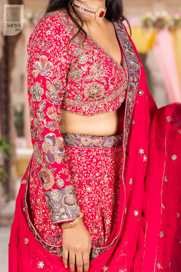 Stunning dark pink georgette half saree like lehenga with an exquisite sleeve border close up view.