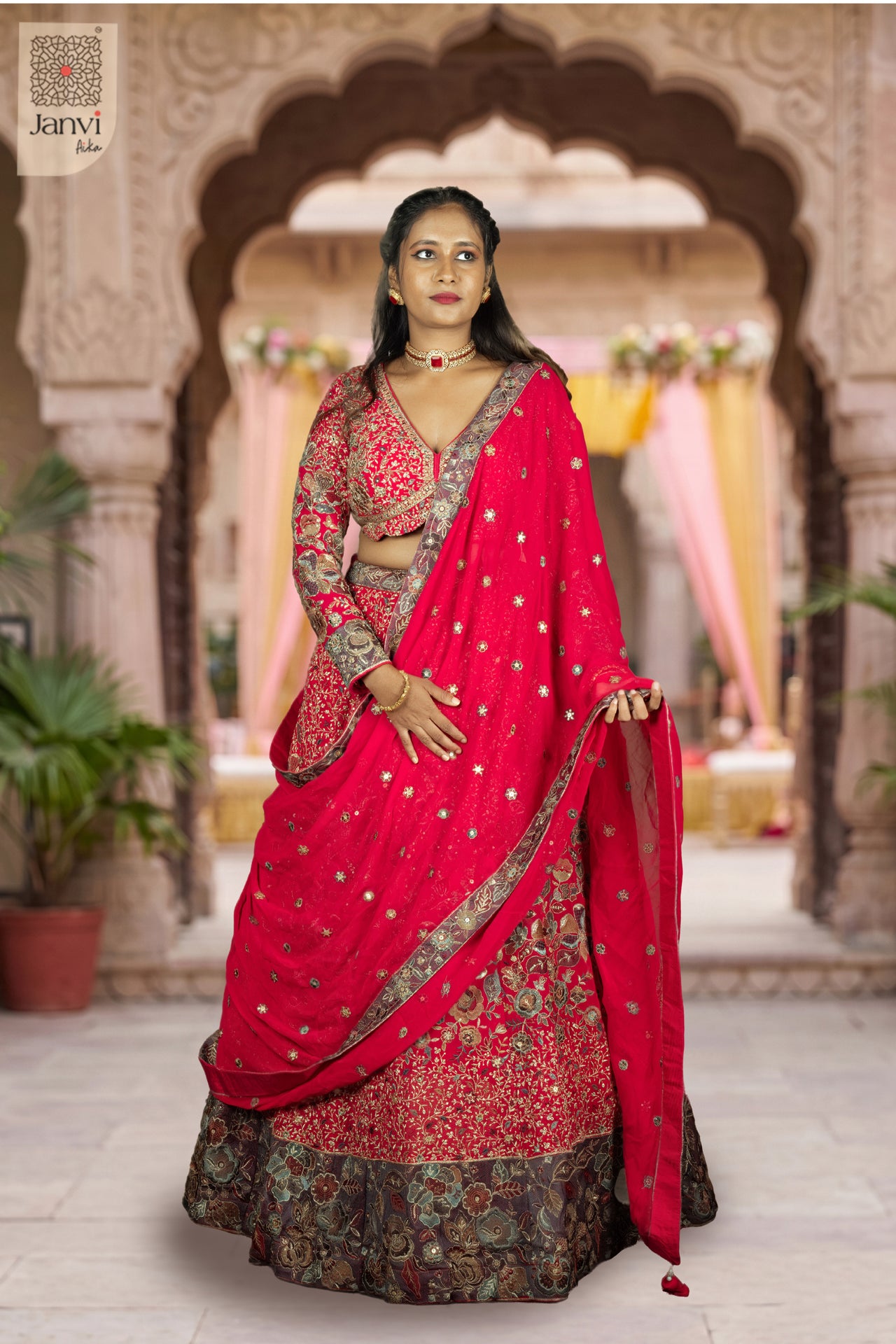 This front full standing shot showcases a gorgeous dark pink georgette chanderi lehenga.