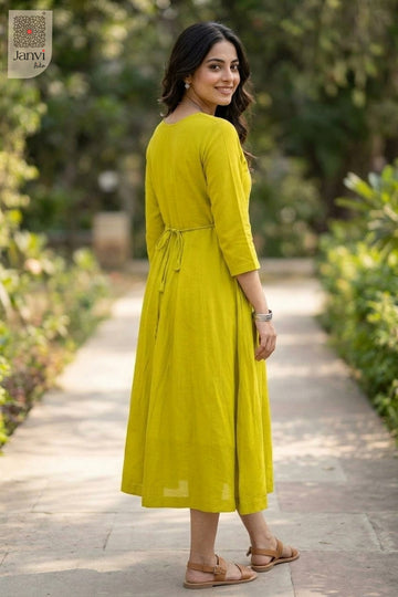 Over the shoulder rear view in moderate yellowish green long tunic tops for women cut