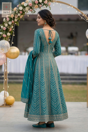 A graceful full body back angle showcases the sweeping silhouette of this reception dress for women.