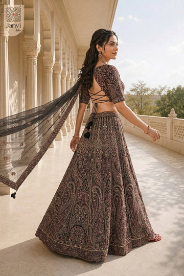 Rear full standing shot of a classic black georgette lehenga colour combination design.