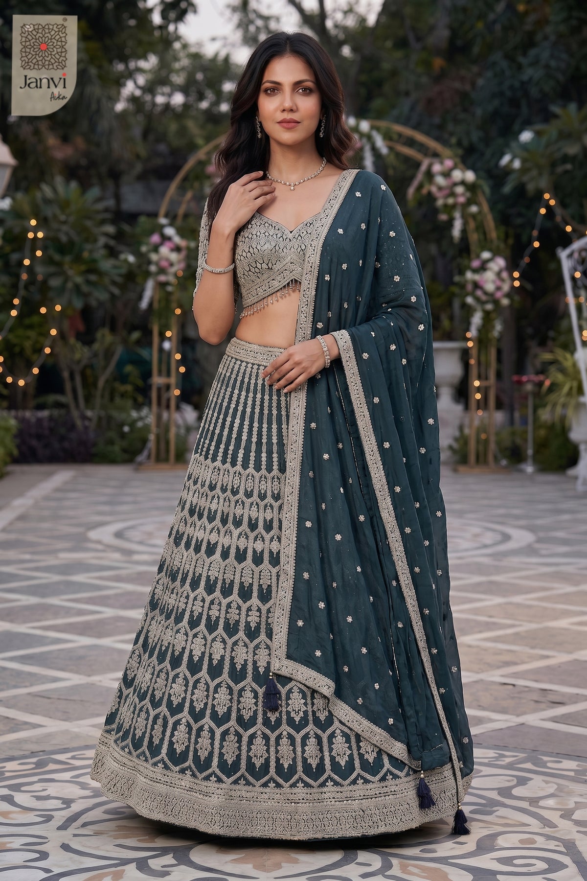 Stunning bottle green georgette lehenga with an exquisite front full standing shot.