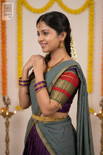 Close up side profile detail of a half saree as a beautiful lehenga style saree.