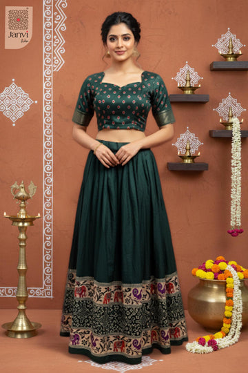 Front full standing shot of a half saree as a beautiful organza lehenga saree for weddings.