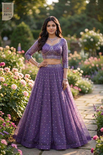 Front full standing shot of a classic purple net fashionable lehenga for women design.