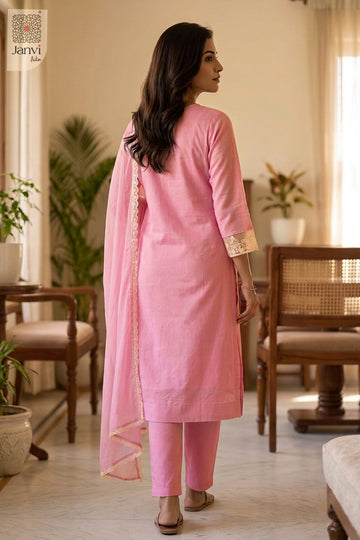 Indoor rear view showing back tailoring and dupatta of a churidar sleeves kurti.