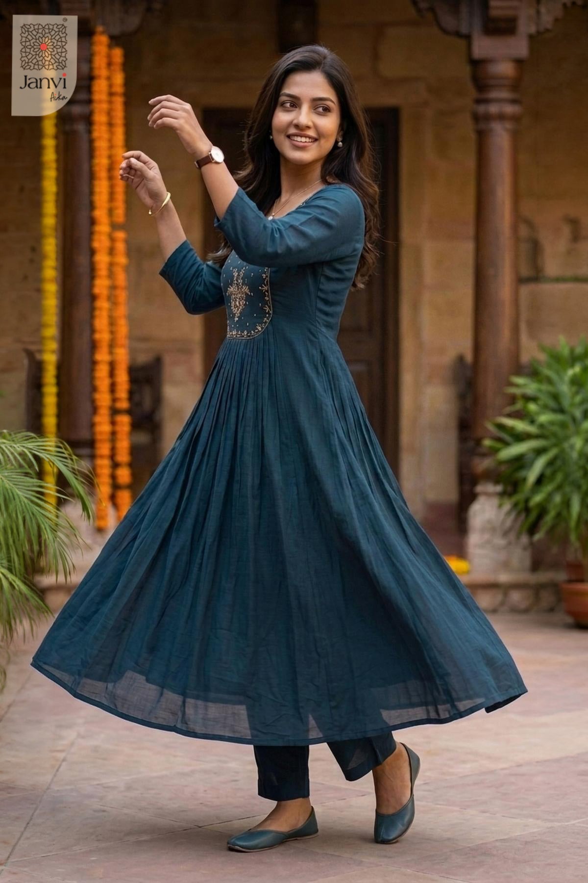 Dynamic twirling motion showing the voluminous flare of a teal blue short anarkali kurti.