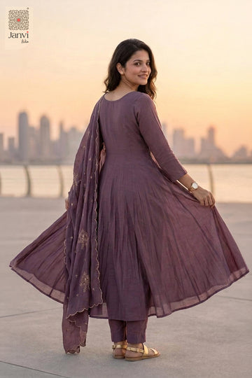 Back view of a dark lavender flared anarkali kurta with draped silk dupatta.