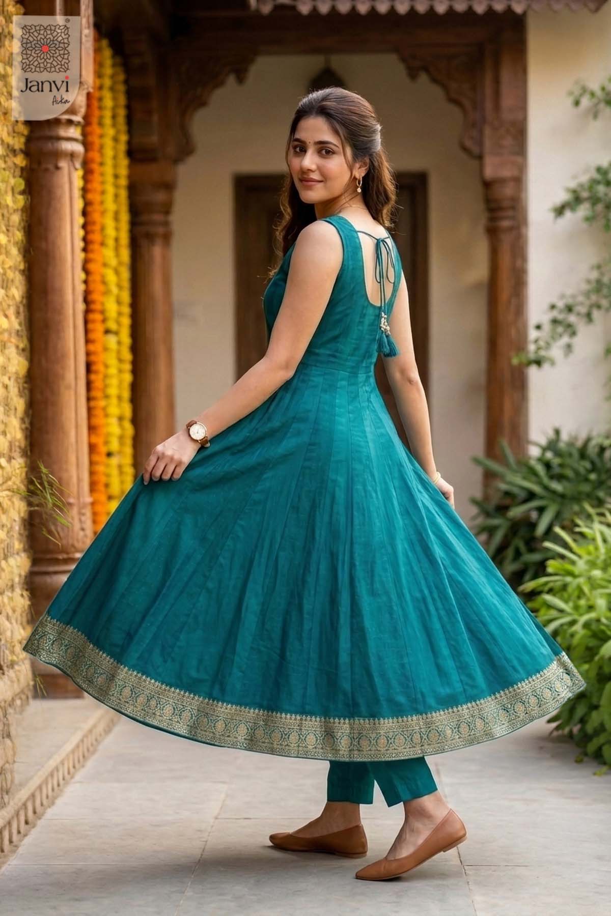 Rear view of a sleeveless ramar green flared anarkali kurta with printed dupatta.